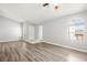 Bright living room featuring stylish floors, arched windows, and a welcoming entryway at 1800 Edmond St # 226, Las Vegas, NV 89146
