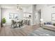 Bright living and dining area featuring contemporary furnishings and open kitchen access at 1800 Edmond St # 226, Las Vegas, NV 89146