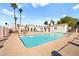 Community pool with clear blue water, shaded seating areas, and well-maintained surroundings for relaxation at 1800 Edmond St # 226, Las Vegas, NV 89146