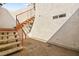 Exterior stairwell with orange railing leading to the second floor of the condo at 1800 Edmond St # 226, Las Vegas, NV 89146