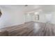 Spacious living area featuring new flooring, neutral paint, and an abundance of natural light at 1905 Aquarius Dr, Las Vegas, NV 89102