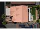 Birds-eye view of a well-maintained property featuring a charming backyard, patio, and desert landscaping at 191 Reed Ln, Henderson, NV 89074