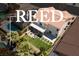 Overhead view of home highlighting outdoor space, including lawn, patio, and guest suite balcony at 191 Reed Ln, Henderson, NV 89074
