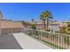 A balcony view featuring lush landscaping and a serene neighborhood at 191 Reed Ln, Henderson, NV 89074