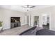Well-lit main bedroom featuring hard floors and an en suite bathroom at 191 Reed Ln, Henderson, NV 89074