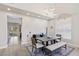 Dining room featuring a modern chandelier, high ceilings, and large arched windows at 191 Reed Ln, Henderson, NV 89074