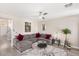 Cozy living room showcasing a plush sectional sofa and stylish decor, perfect for relaxation at 191 Reed Ln, Henderson, NV 89074