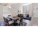 Bright living and dining area with high ceilings, lots of natural light, and an open floor plan at 191 Reed Ln, Henderson, NV 89074
