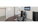 Spacious room with a desk, chair, and shelving, ideal for a home office or study area at 191 Reed Ln, Henderson, NV 89074