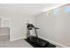 Bright room featuring a treadmill and neutral carpeting, perfect for home fitness and exercise at 191 Reed Ln, Henderson, NV 89074