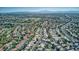 A beautiful aerial view of the neighborhood with a golf course in the background and convenient roads at 1933 Coralino Dr, Henderson, NV 89074