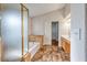 Bathroom featuring a shower, tub, tile floors, and double-door closet with a sink and wooden cabinets at 1933 Coralino Dr, Henderson, NV 89074
