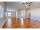 Spacious bedroom featuring wood floors, vaulted ceilings and ensuite bathroom at 1933 Coralino Dr, Henderson, NV 89074