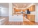 Modern kitchen with light wood cabinetry, stainless steel appliances, and an open layout at 1933 Coralino Dr, Henderson, NV 89074