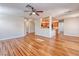 Bright living area with ceiling fan and view of kitchen at 1933 Coralino Dr, Henderson, NV 89074