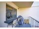 Covered balcony including a built-in wet bar and stools at 205 E Harmon Ave # 306, Las Vegas, NV 89169