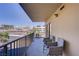 Spacious balcony with seating offers views of the city skyline at 205 E Harmon Ave # 306, Las Vegas, NV 89169