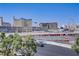 Panoramic city view featuring iconic landmarks and a bustling cityscape under a clear blue sky at 205 E Harmon Ave # 306, Las Vegas, NV 89169