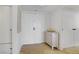 Bright condo entryway featuring double doors and decorative console table at 205 E Harmon Ave # 306, Las Vegas, NV 89169