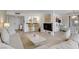 Open concept living room features bar area, comfortable seating and light tile floors at 205 E Harmon Ave # 306, Las Vegas, NV 89169