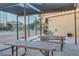 Community picnic area with shaded seating and a grill, great for outdoor gatherings at 205 E Harmon Ave # 306, Las Vegas, NV 89169