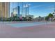 Exterior image showcasing community tennis courts with city views at 205 E Harmon Ave # 306, Las Vegas, NV 89169