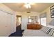 Bedroom features coordinating window treatments, dresser, and large closet at 2305 Flower Spring St, Las Vegas, NV 89134