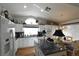 Bright kitchen with a large island, stainless appliances, and a breakfast nook at 2305 Flower Spring St, Las Vegas, NV 89134