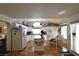 Bright eat-in kitchen with white cabinets, stainless appliances, and center island at 2305 Flower Spring St, Las Vegas, NV 89134