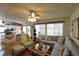 Open concept living space with hardwood floors, recessed lighting, and a view of the kitchen at 2305 Flower Spring St, Las Vegas, NV 89134