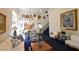 Bright and spacious living room with vaulted ceilings and a decorative staircase at 2305 Flower Spring St, Las Vegas, NV 89134