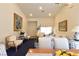Open-concept living room and dining area featuring elegant decor, and vaulted ceilings at 2305 Flower Spring St, Las Vegas, NV 89134