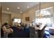 Bright living space with vaulted ceilings, elegant furnishings, a dining area, and natural lighting at 2305 Flower Spring St, Las Vegas, NV 89134