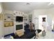 A main bedroom view of a fireplace, TV, and an adjoining bathroom and closet at 2305 Flower Spring St, Las Vegas, NV 89134