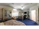 Expansive main bedroom featuring a fireplace, television, and ornate furnishings at 2305 Flower Spring St, Las Vegas, NV 89134
