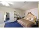 A bright main bedroom featuring a luxurious bed and stylish decor at 2305 Flower Spring St, Las Vegas, NV 89134