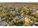 Lush neighborhood with tree-lined streets, showcasing diverse homes and lush landscaping, creating a serene setting at 2316 Prometheus Ct, Henderson, NV 89074