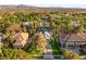 Panoramic aerial view of a home within a lush neighborhood offers an exceptional sense of community at 2316 Prometheus Ct, Henderson, NV 89074