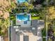 Amazing aerial view of a home and pool, set amongst manicured grounds with walking stones, and mature trees at 2316 Prometheus Ct, Henderson, NV 89074