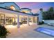 Expansive backyard with a sparkling pool, spa, and covered patio, perfect for outdoor entertaining and relaxation at 2316 Prometheus Ct, Henderson, NV 89074