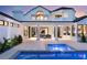 Gorgeous outdoor space featuring a sparkling pool, covered patio, and plenty of space for entertaining at 2316 Prometheus Ct, Henderson, NV 89074