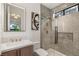 Contemporary bathroom featuring a glass shower, marble countertop, and modern fixtures at 2316 Prometheus Ct, Henderson, NV 89074