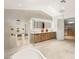 Luxurious bathroom with double vanity, glass shower, and modern fixtures at 2316 Prometheus Ct, Henderson, NV 89074