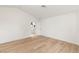Bright bedroom with wood floors and a door to the balcony at 2316 Prometheus Ct, Henderson, NV 89074