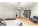 Bright bedroom featuring contemporary lighting, hardwood floors, and ample space at 2316 Prometheus Ct, Henderson, NV 89074