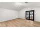 Bright bedroom with wood floors and french doors at 2316 Prometheus Ct, Henderson, NV 89074