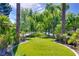 Beautiful community greenbelt with manicured landscaping, mature trees, and serene walking paths at 2316 Prometheus Ct, Henderson, NV 89074