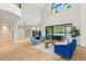 Bright, open living room with a soaring ceiling, refined finishes and a stunning backyard view at 2316 Prometheus Ct, Henderson, NV 89074