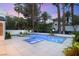 Beautiful backyard oasis with a sparkling pool and spa, perfect for relaxing and entertaining guests at 2316 Prometheus Ct, Henderson, NV 89074