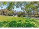 Community tennis court with well-maintained landscaping and mature trees surrounding the court at 2316 Prometheus Ct, Henderson, NV 89074